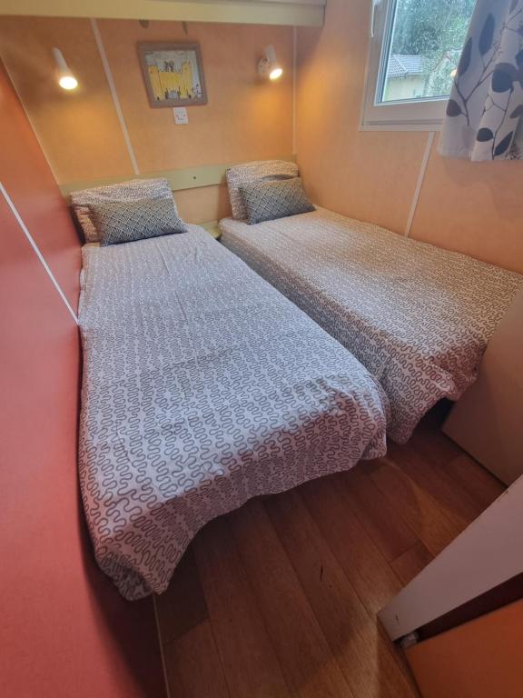 Postel nebo postele na pokoji v ubytování Camping L'Orée des Cévennes