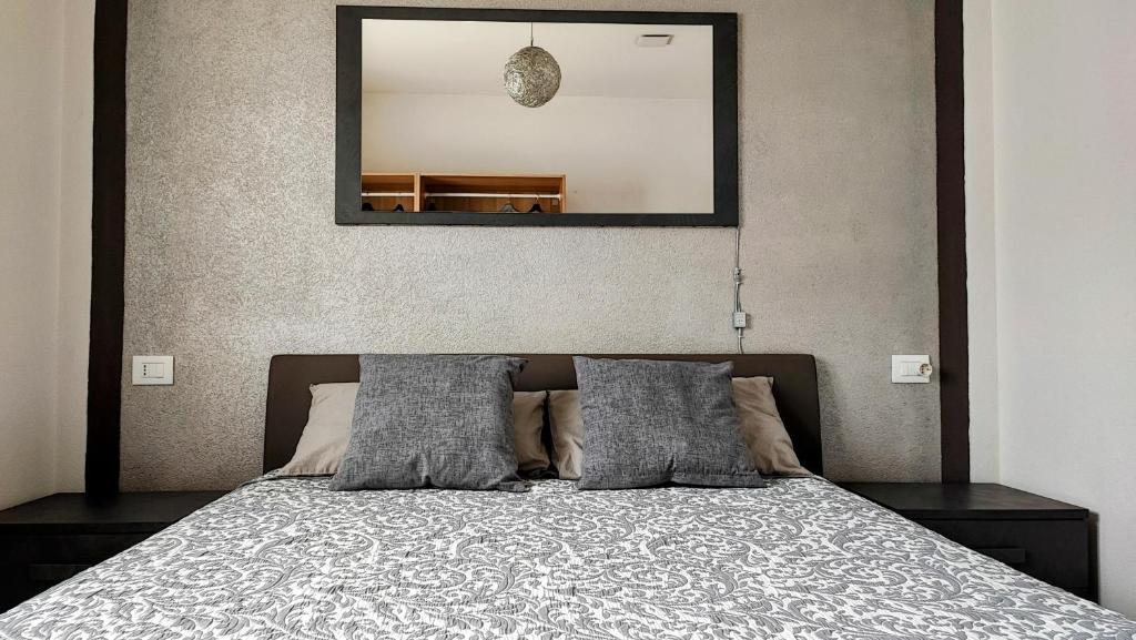 Postel nebo postele na pokoji v ubytování FabysHouse Appartamento in Villa