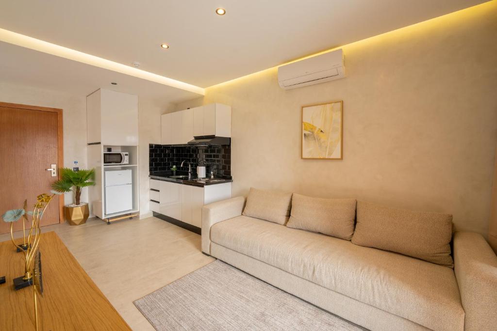 Kuchyň nebo kuchyňský kout v ubytování Appart Hôtel Rambla