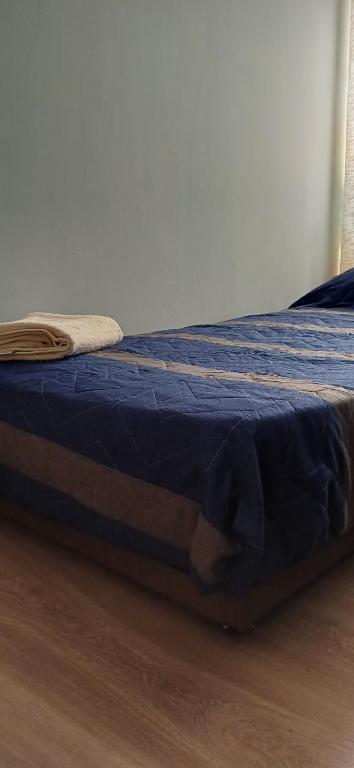 Postel nebo postele na pokoji v ubytování Excelente Habitación en Centro de Santiago