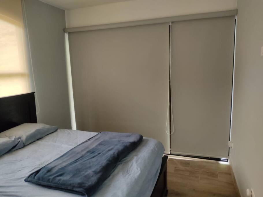 Postel nebo postele na pokoji v ubytování Cabaña Samu