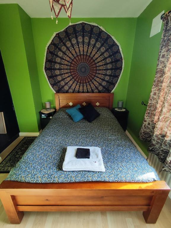 Postel nebo postele na pokoji v ubytování The Green Room Homestay