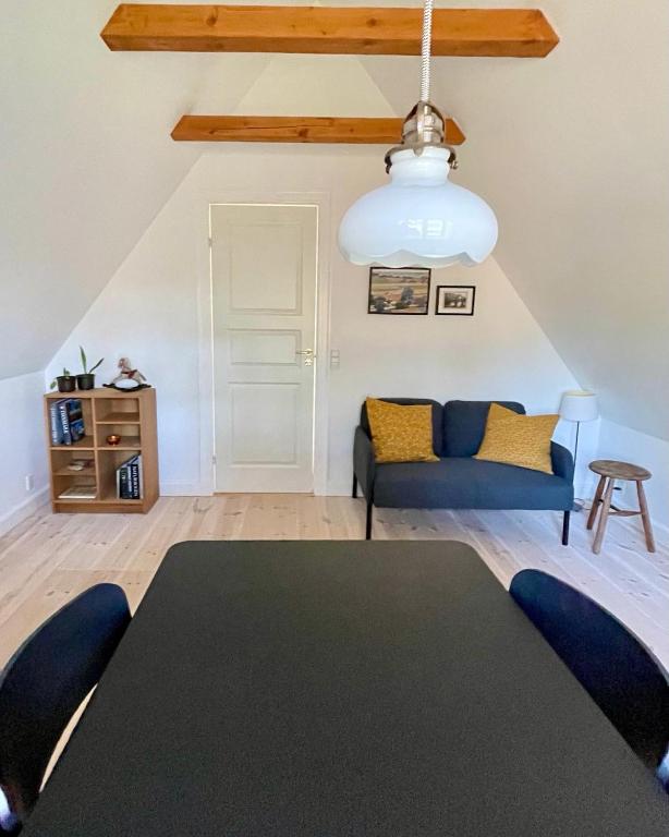 Postel nebo postele na pokoji v ubytování Strandby 1847 B&B