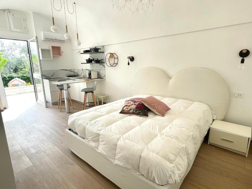 Postel nebo postele na pokoji v ubytování B&B Case Vacanza Orchidea marina di Macchia vicino a Mattinata Gargano