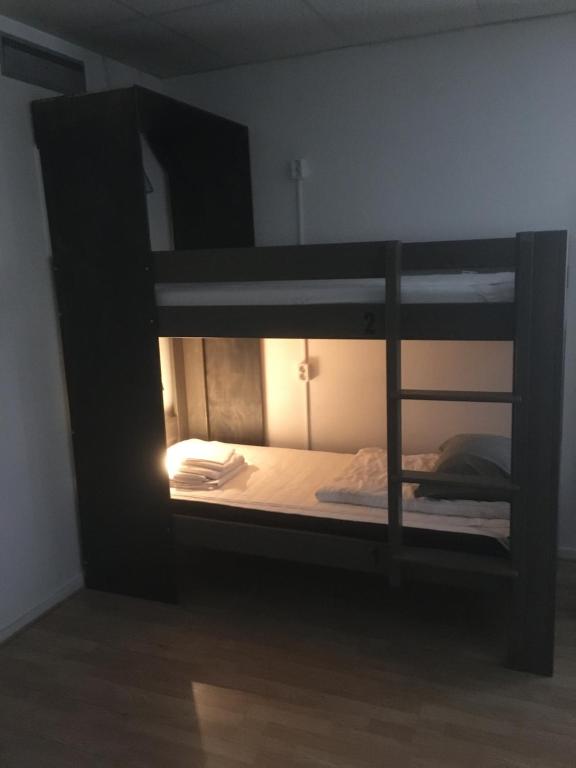 Postel nebo postele na pokoji v ubytování Hostel Snoozemore