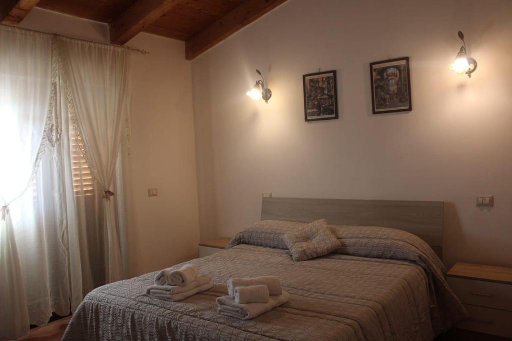 Ένα ή περισσότερα κρεβάτια σε δωμάτιο στο Bed & Breakfast Il Sentiero