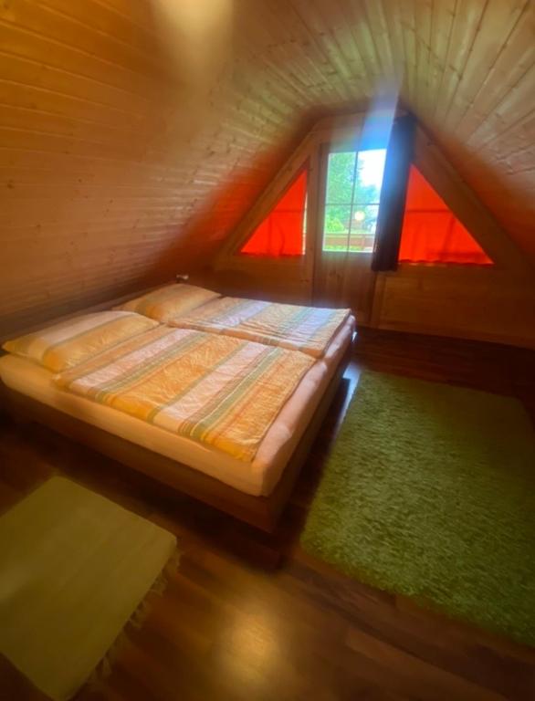 Postel nebo postele na pokoji v ubytování Faaakersee Familyhouse - mit PrivatStrand- Seeblick