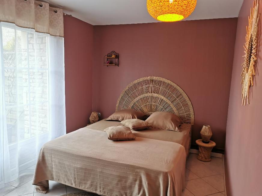 Postel nebo postele na pokoji v ubytování BIENVENUE CHEZ NOUS