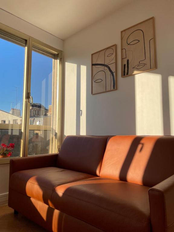 Część wypoczynkowa w obiekcie Sweet house in Paris