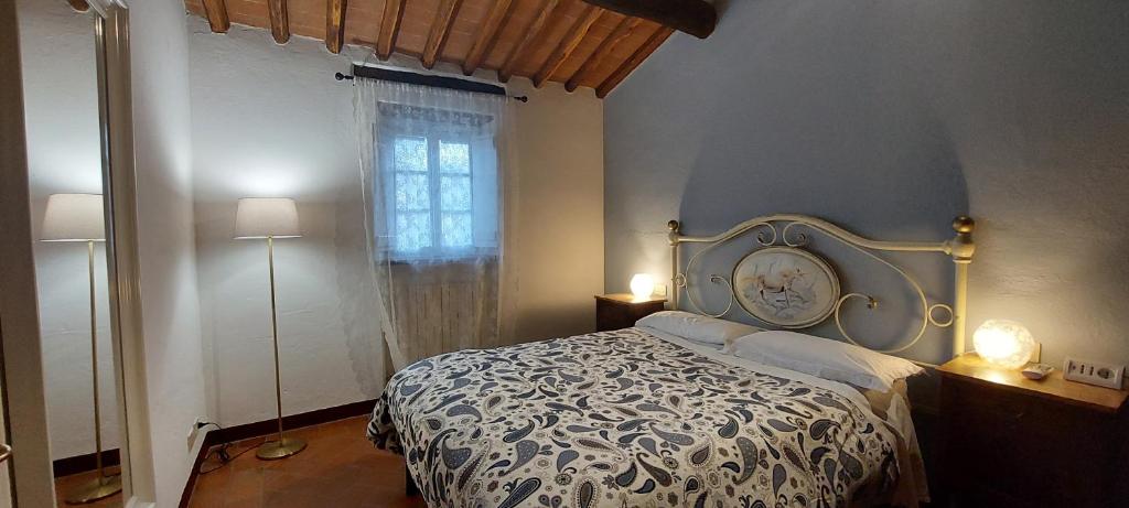 Postel nebo postele na pokoji v ubytování Casabeppe