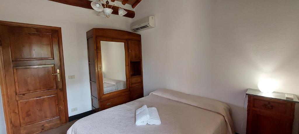 Postel nebo postele na pokoji v ubytování Casabeppe