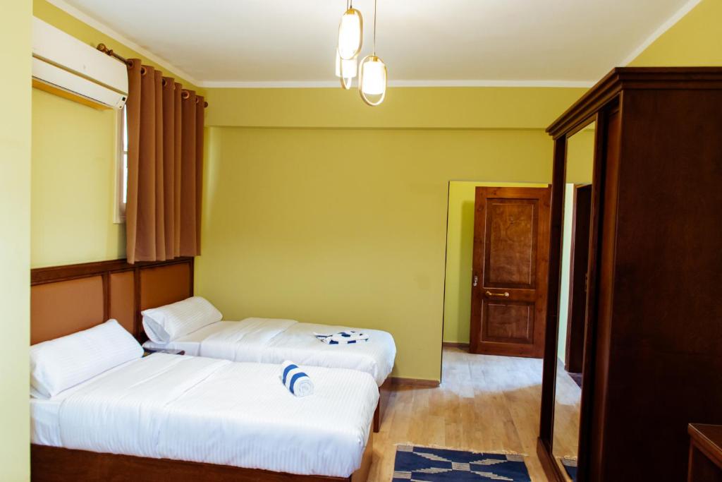 Postel nebo postele na pokoji v ubytování 2Rest