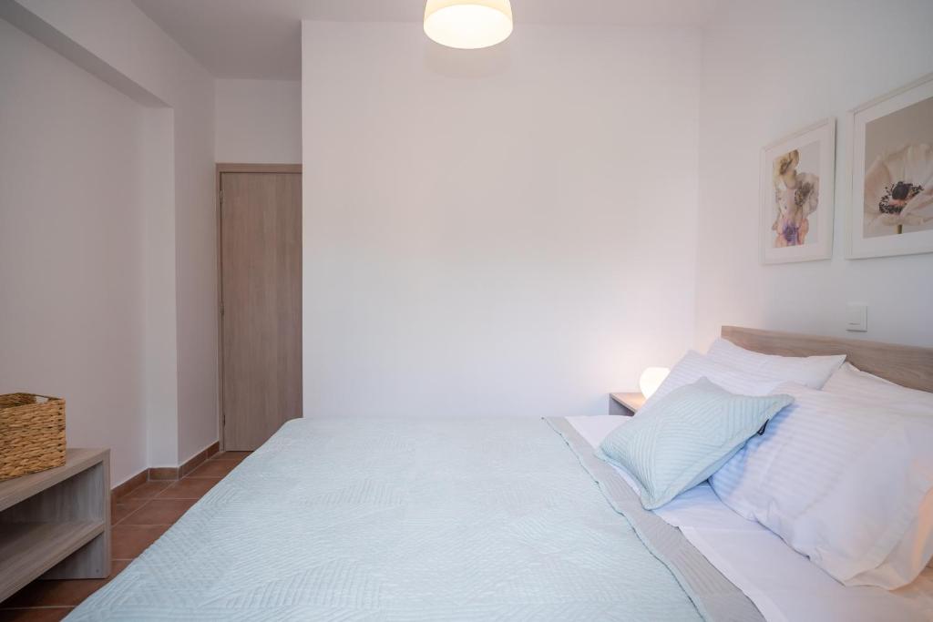 Postel nebo postele na pokoji v ubytování Villa Zoi