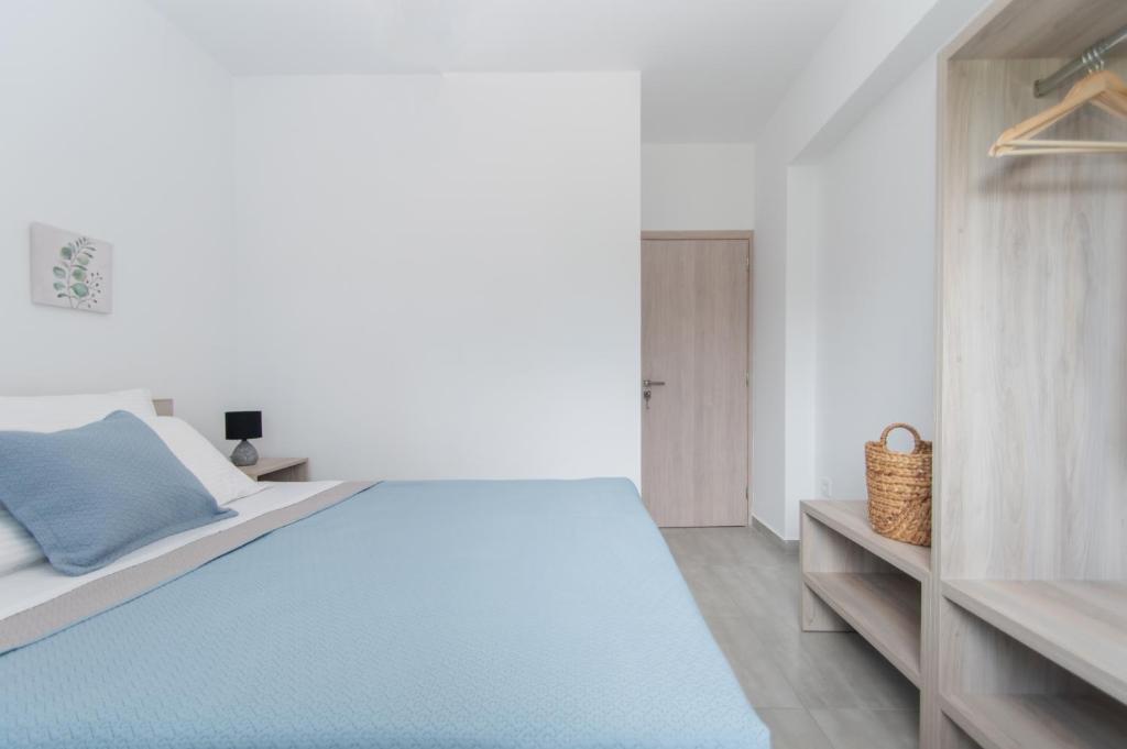 Postel nebo postele na pokoji v ubytování Villa Zoi
