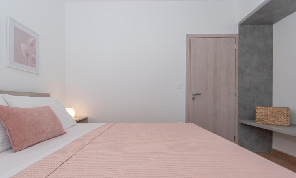 Postel nebo postele na pokoji v ubytování Villa Zoi