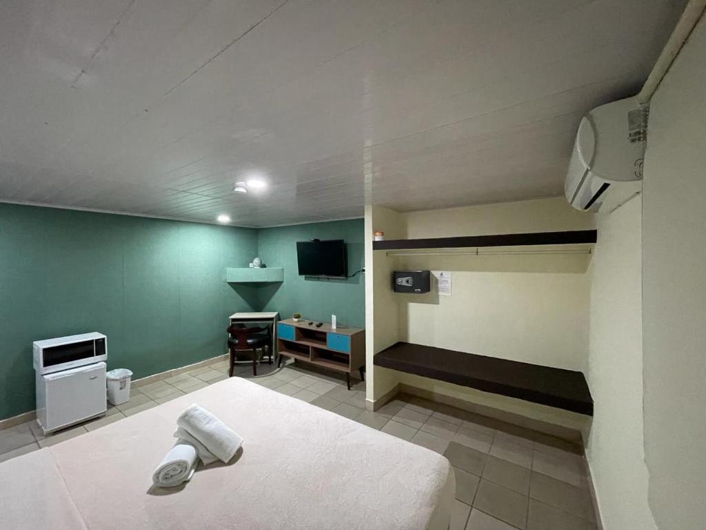 Voodi või voodid majutusasutuse Hostal EL Prado toas