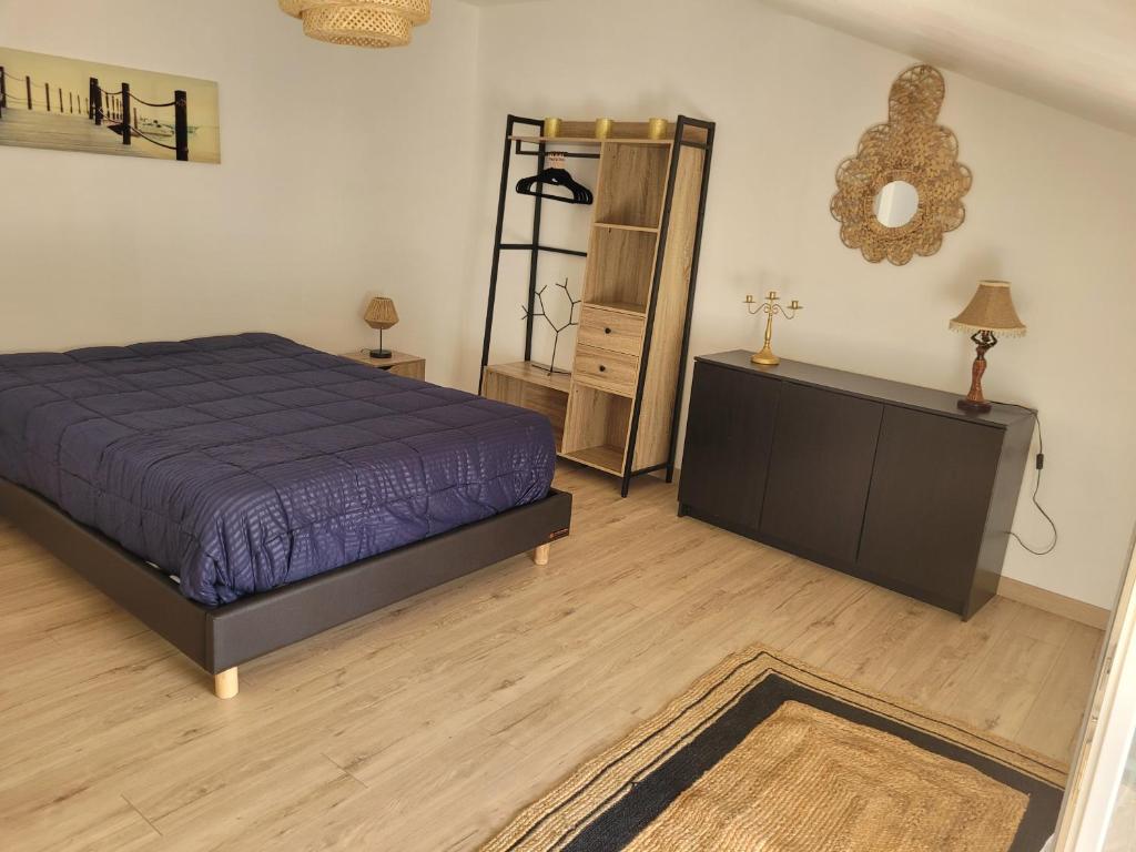 Een bed of bedden in een kamer bij La Cadole
