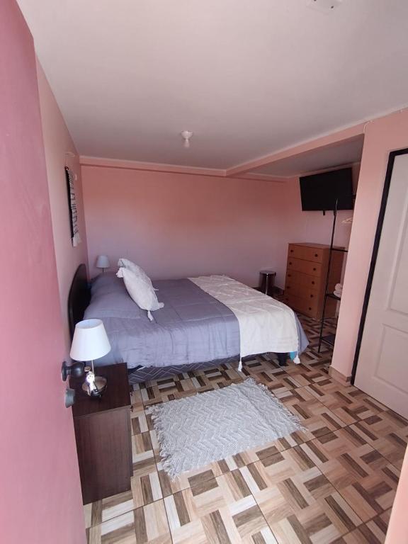 Letto o letti in una camera di Hostal el hermanito