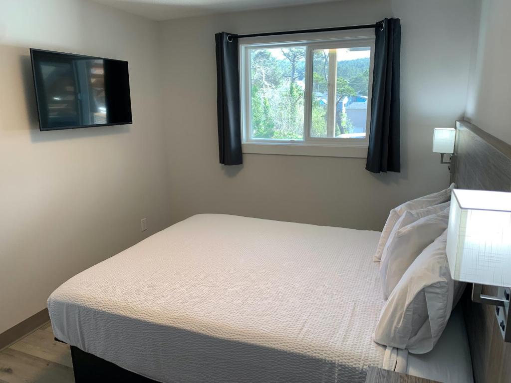 Postel nebo postele na pokoji v ubytování West Beach Suites