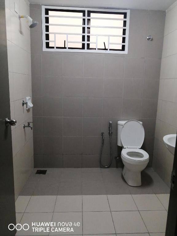 Koupelna v ubytování KASTURI GUEST HOUSE PUTRAJAYA