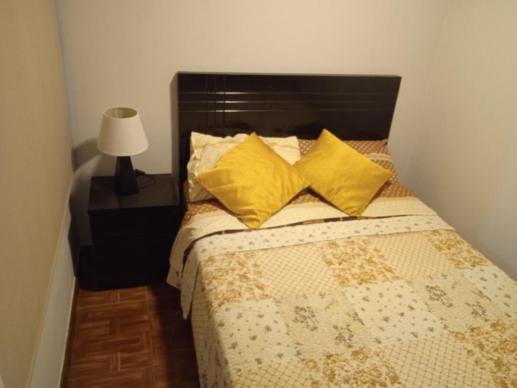 Ένα ή περισσότερα κρεβάτια σε δωμάτιο στο depa viajero