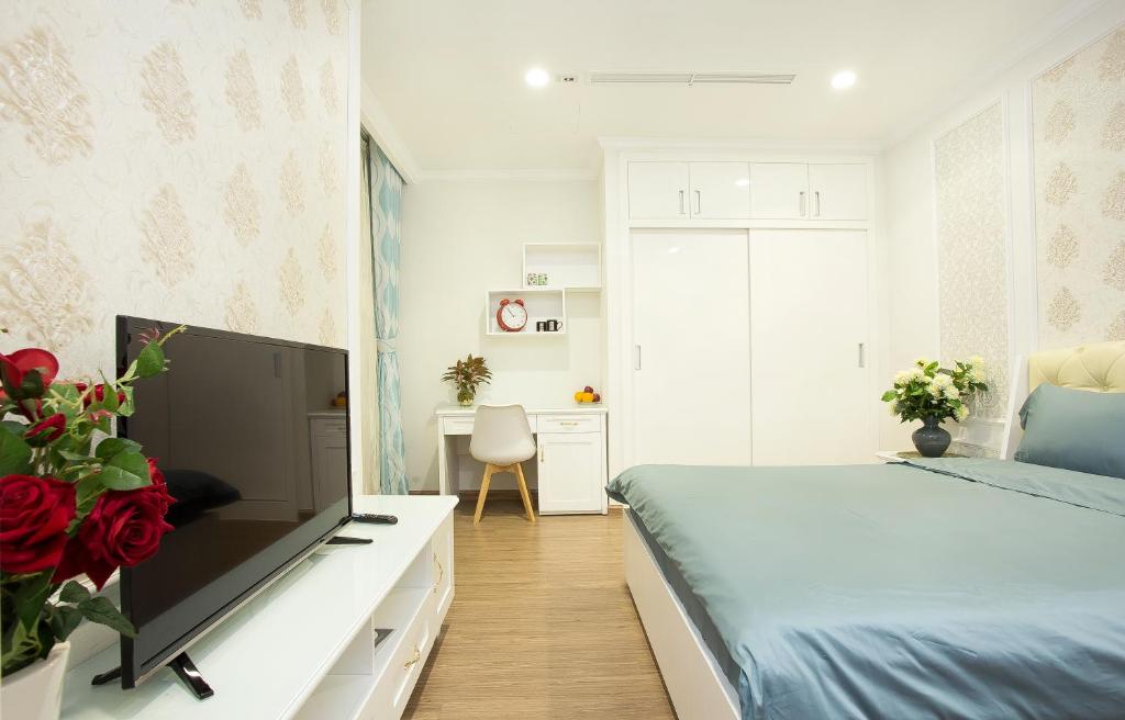 TV a/nebo společenská místnost v ubytování Saigon Downtown - Rivergate Residence
