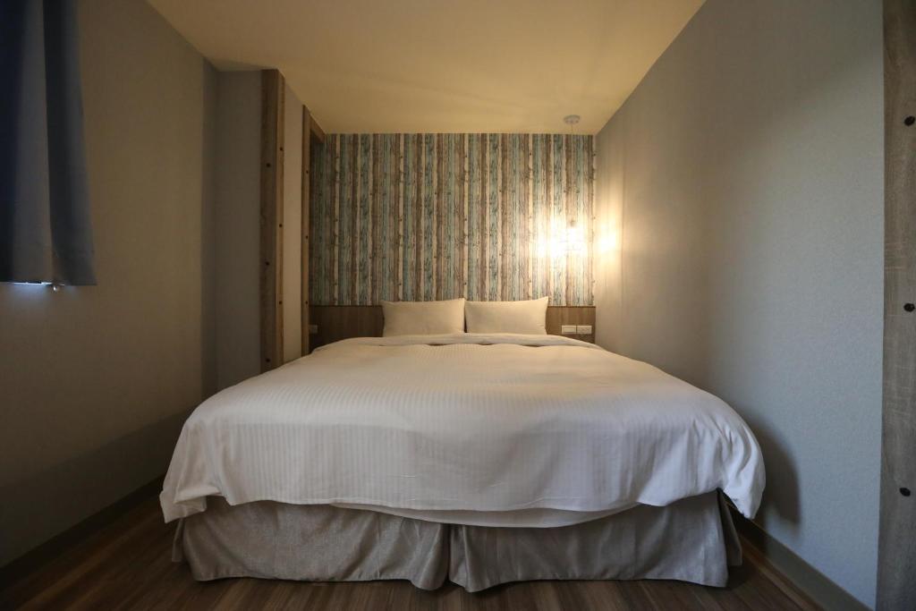 Postel nebo postele na pokoji v ubytování Central Hotel