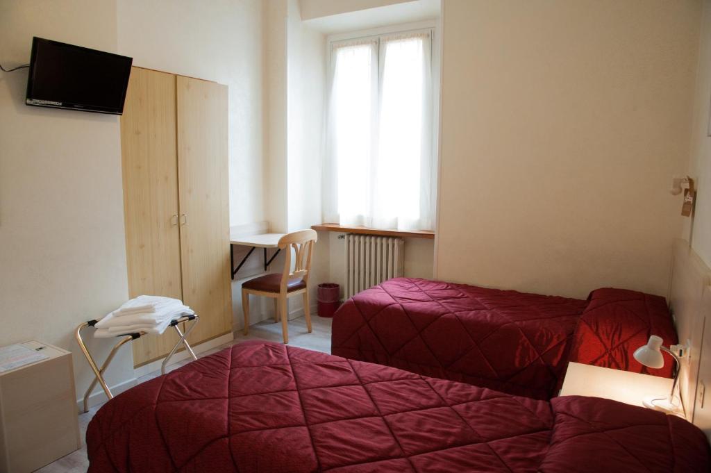 Postel nebo postele na pokoji v ubytování Antico Albergo