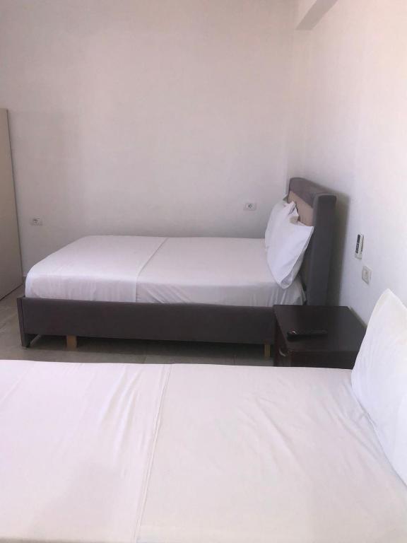 Postel nebo postele na pokoji v ubytování VILLA SILVI KSAMiL