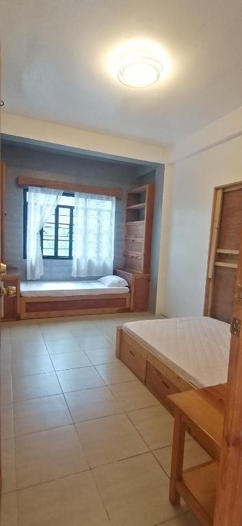 Postel nebo postele na pokoji v ubytování Mavy's Maligcong Homestay