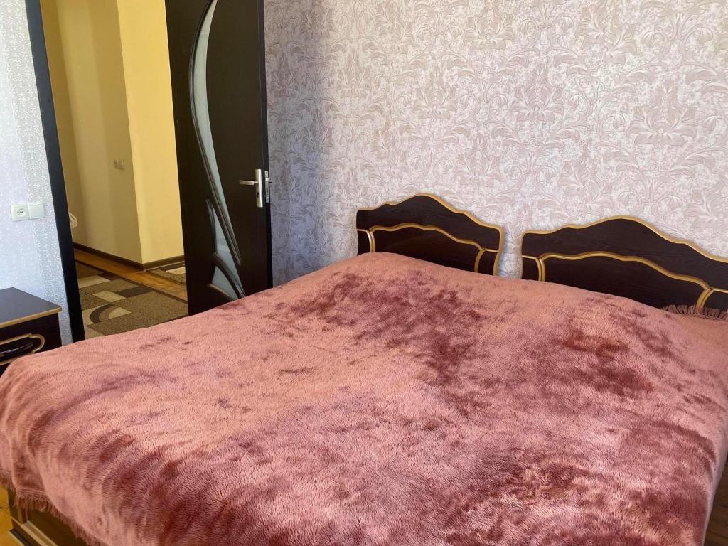Postel nebo postele na pokoji v ubytování Guesthouse _ DAVITI