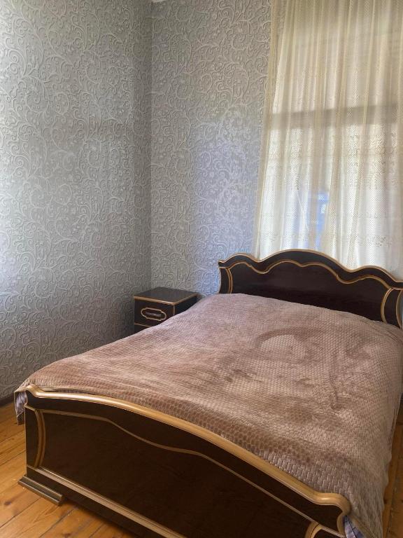 Postel nebo postele na pokoji v ubytování Guesthouse _ DAVITI