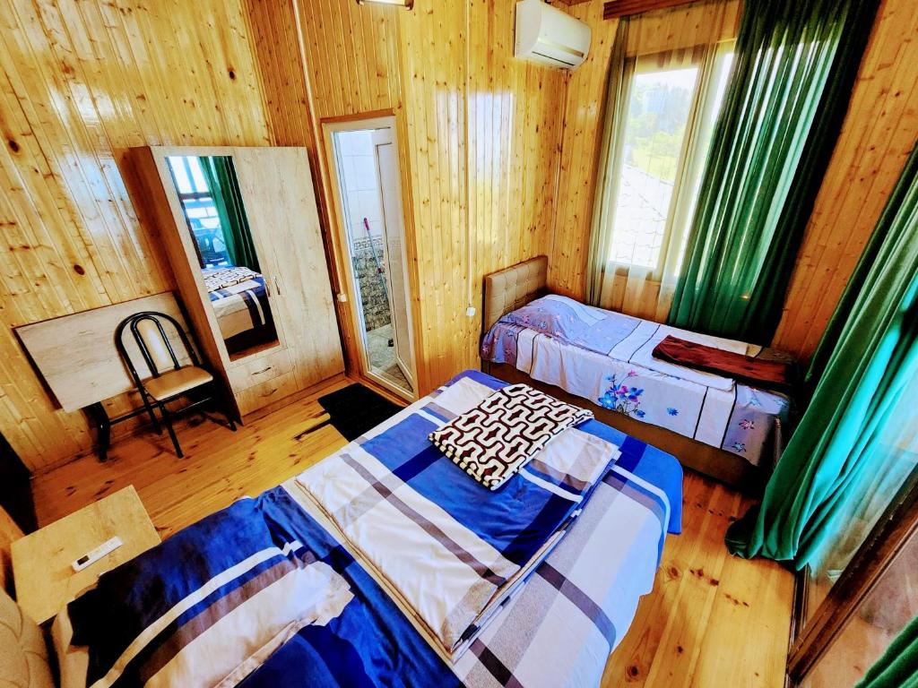 Postel nebo postele na pokoji v ubytování GUEST HOUSE NONA