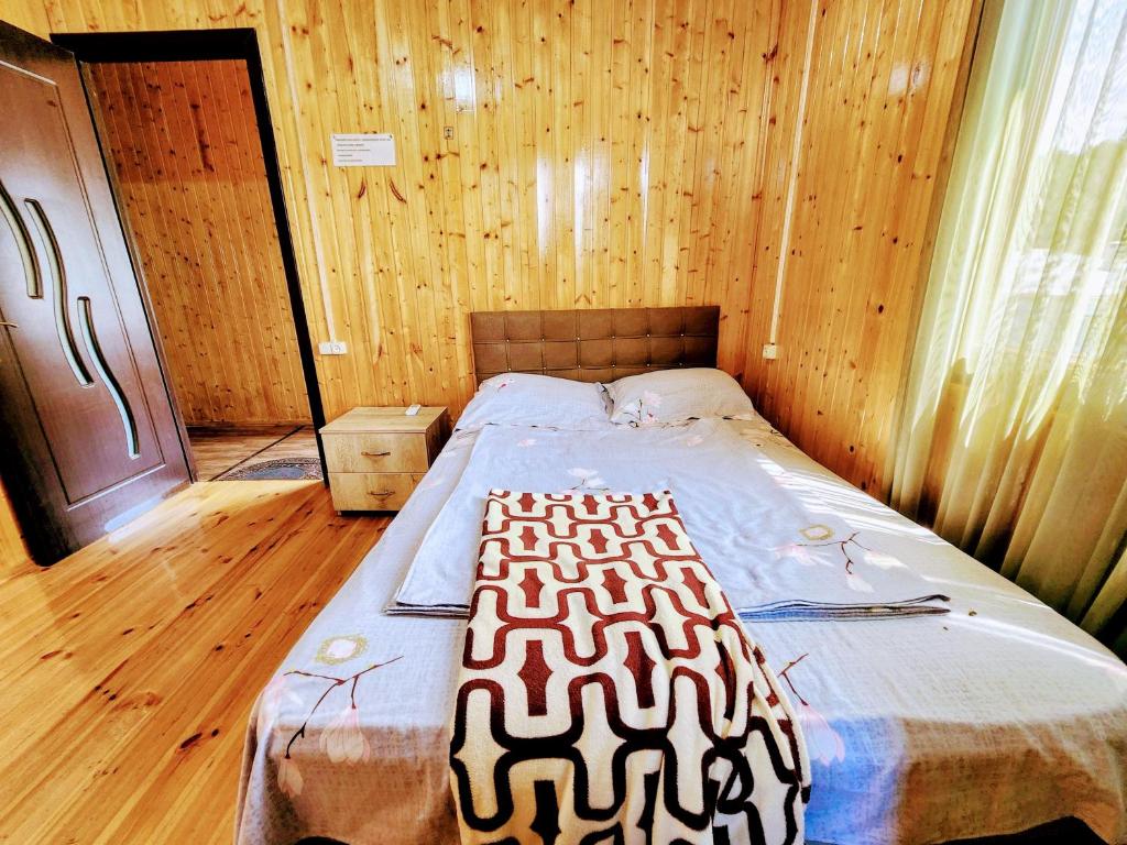 Postel nebo postele na pokoji v ubytování GUEST HOUSE NONA