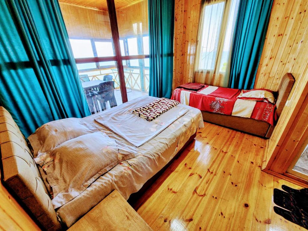 Postel nebo postele na pokoji v ubytování GUEST HOUSE NONA