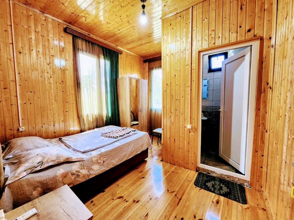 Postel nebo postele na pokoji v ubytování GUEST HOUSE NONA