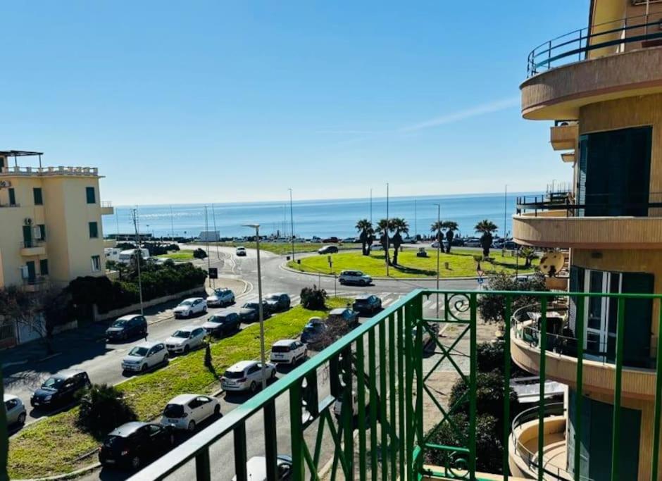 a view of a parking lot with cars parked at Sun&Sea Apartment in Lido di Ostia