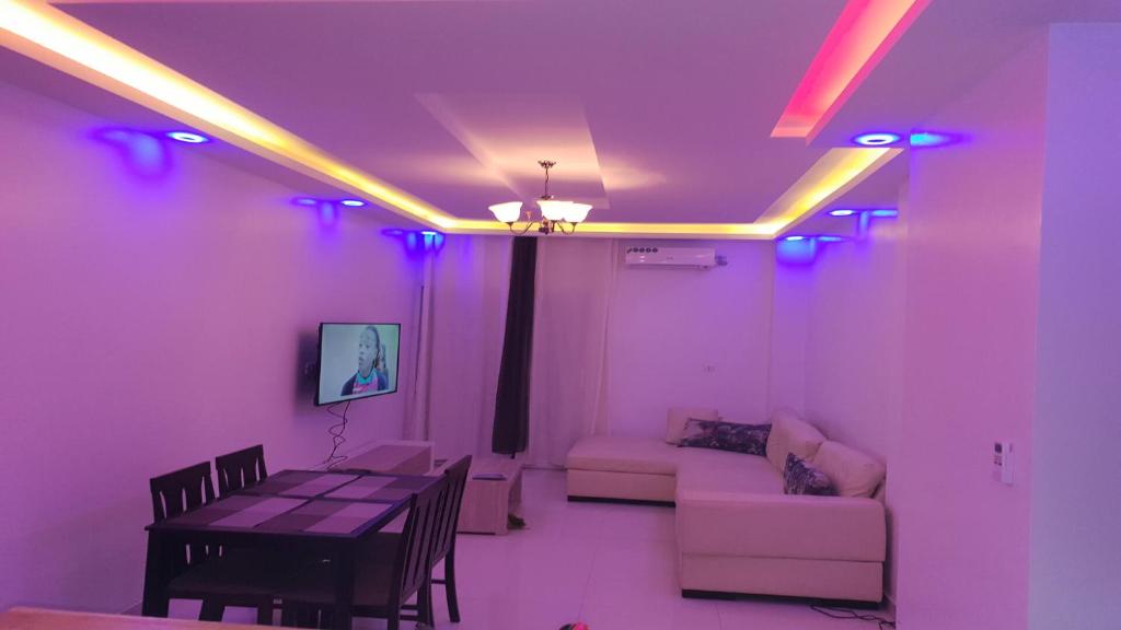 TV a/nebo společenská místnost v ubytování Luxueux Appartement F3