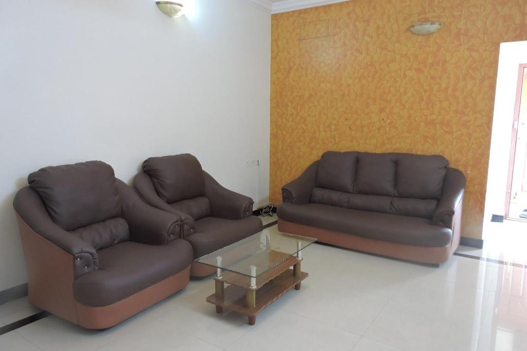 Posezení v ubytování Roshini Serviced Apartments