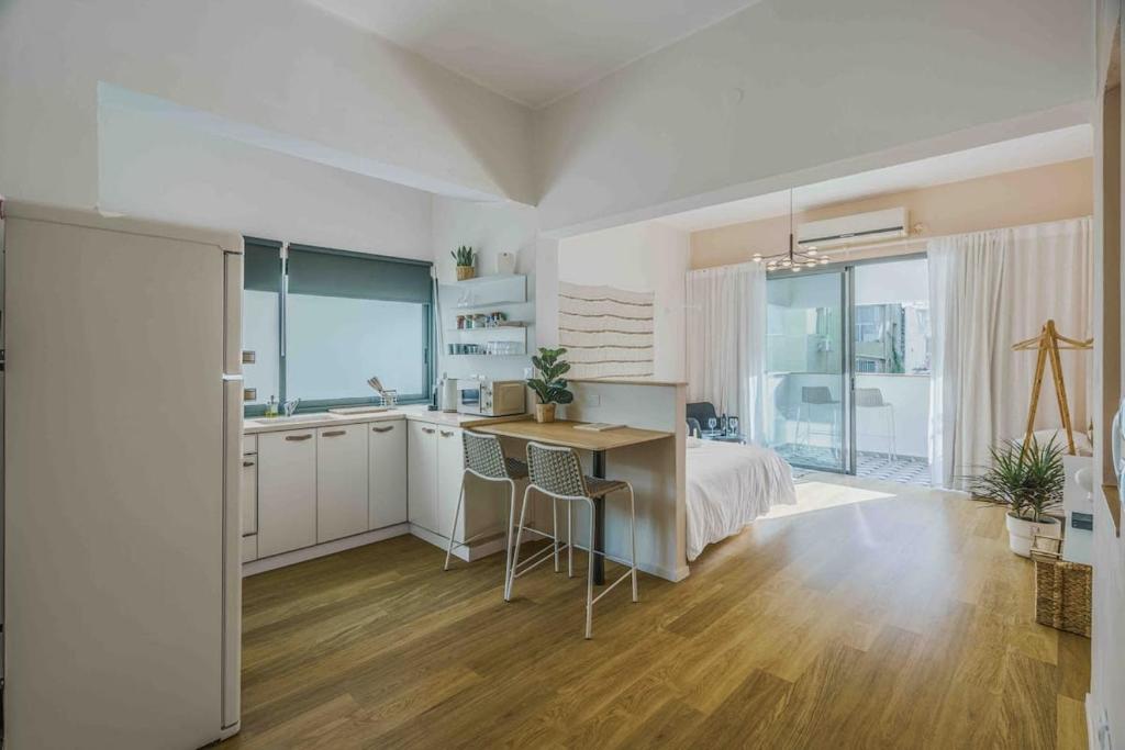 Kuchyň nebo kuchyňský kout v ubytování Amazing loft visionary apartment