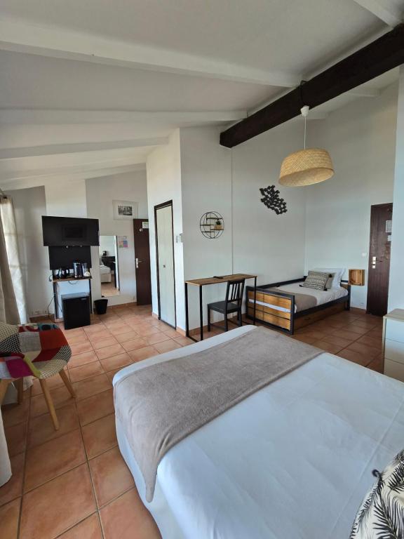 Postel nebo postele na pokoji v ubytování Hotel Chanteplage