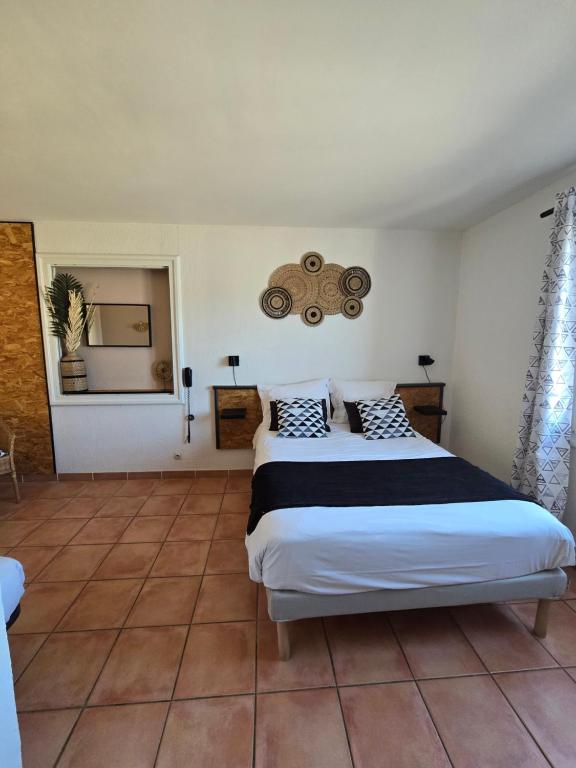 Postel nebo postele na pokoji v ubytování Hotel Chanteplage