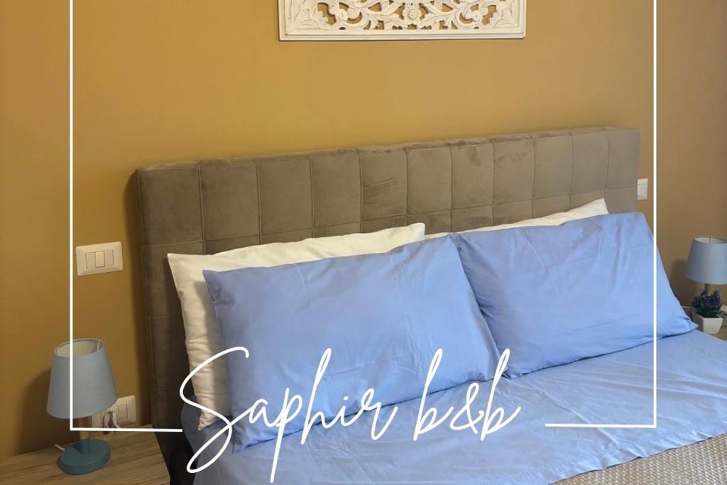Postel nebo postele na pokoji v ubytování Saphir b&b