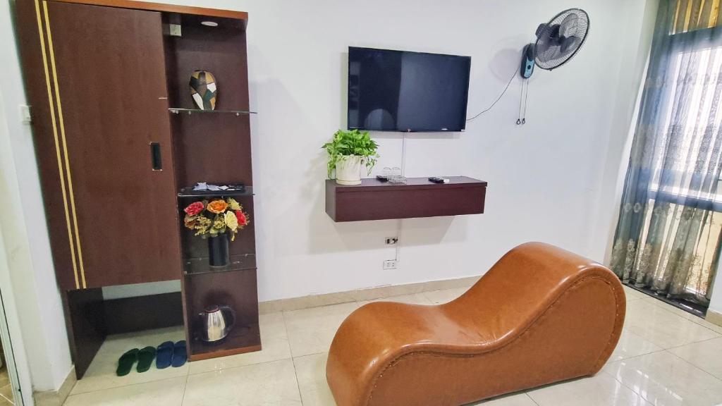 TV a/nebo společenská místnost v ubytování Binh Nguyen Hotel 2