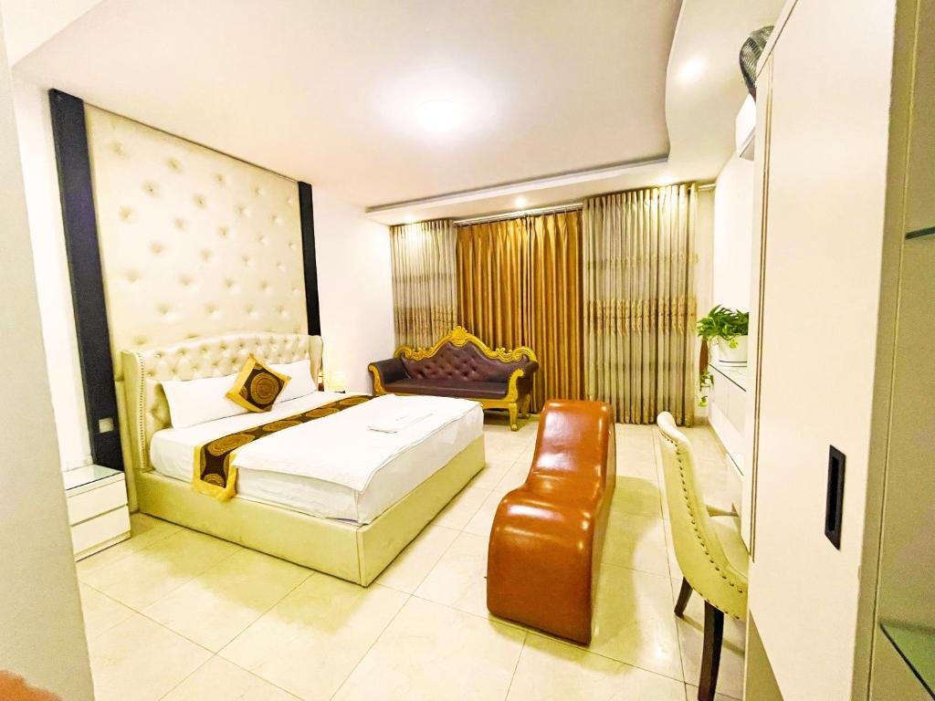 Postel nebo postele na pokoji v ubytování Binh Nguyen Hotel 2