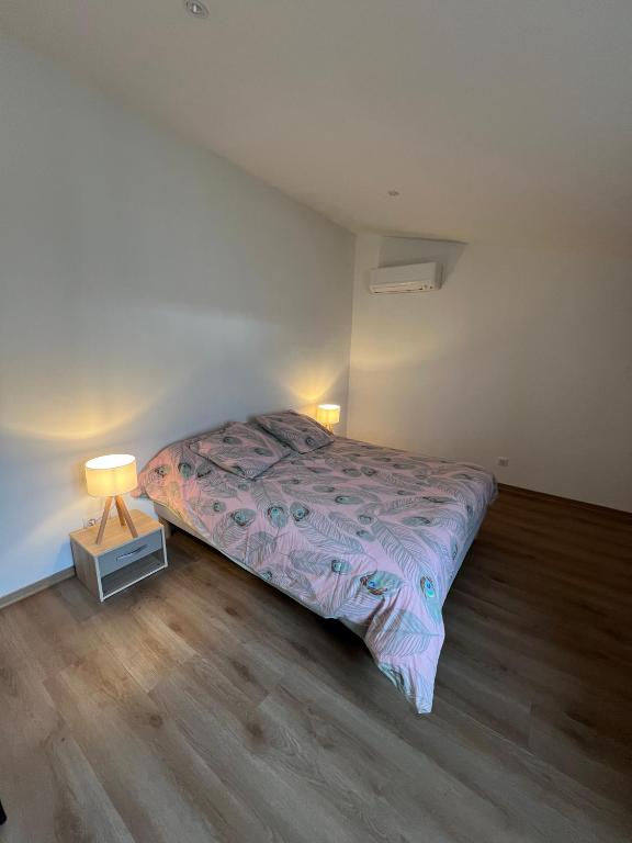 Postel nebo postele na pokoji v ubytování Le Cabanon de Pépé