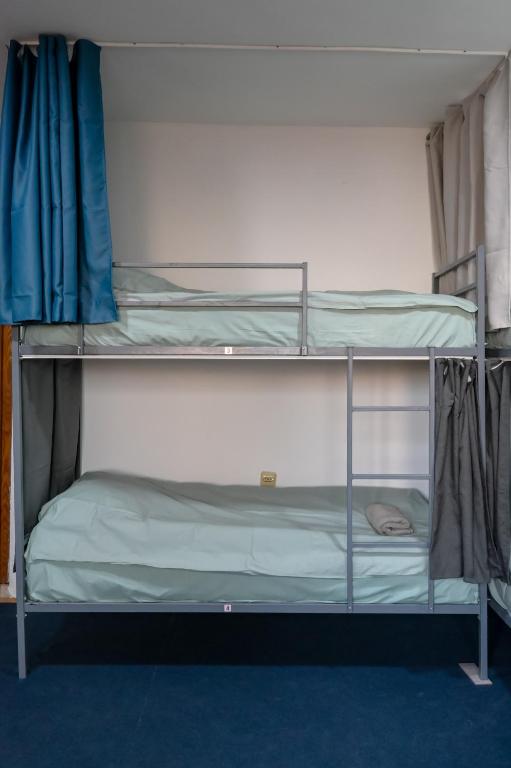 Postel nebo postele na pokoji v ubytování Hostel Best Skopje