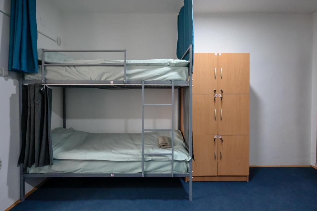 Postel nebo postele na pokoji v ubytování Hostel Best Skopje
