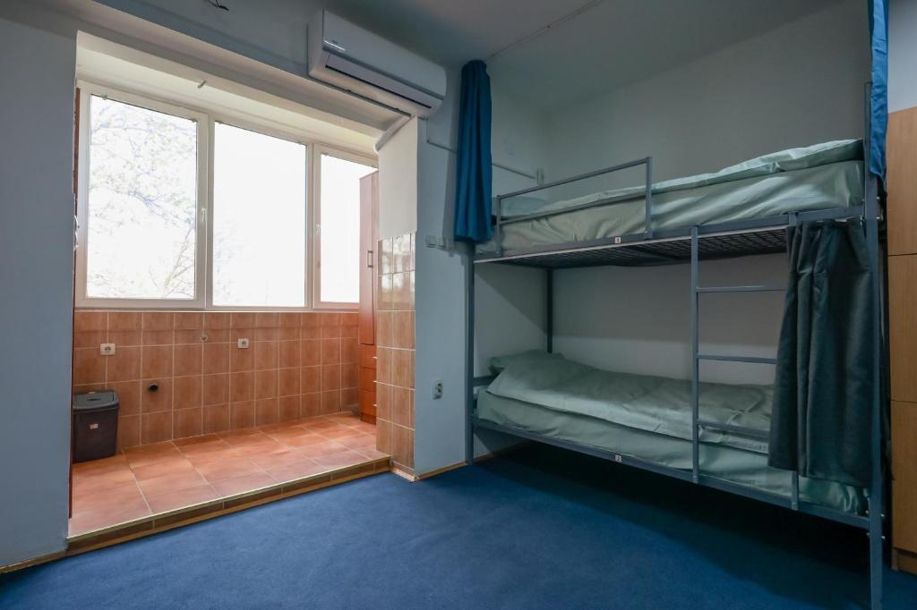 Postel nebo postele na pokoji v ubytování Hostel Best Skopje
