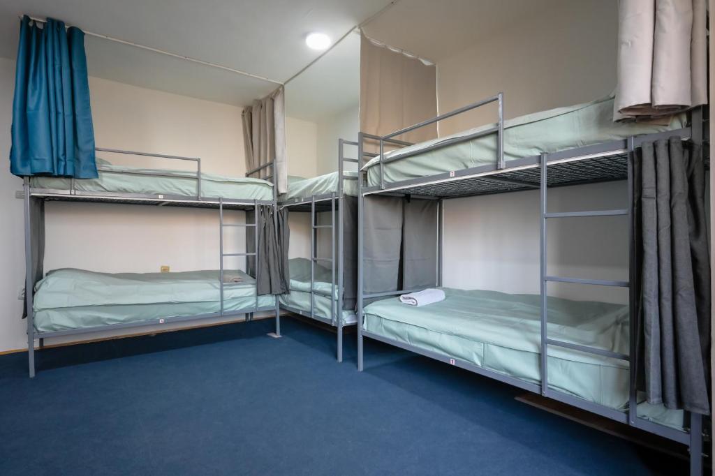 Postel nebo postele na pokoji v ubytování Hostel Best Skopje